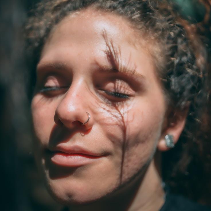 Alex Chen, Lead Design Curator at Calm Forward Path Way, reviewing corporate floral arrangements